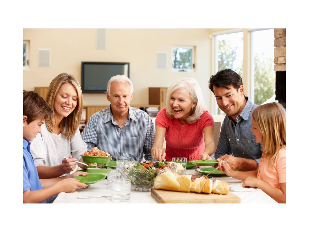 Multi-generational family enjoying dinner together